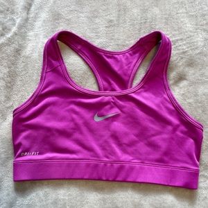 Purple-pinkish Nike sports bra.
